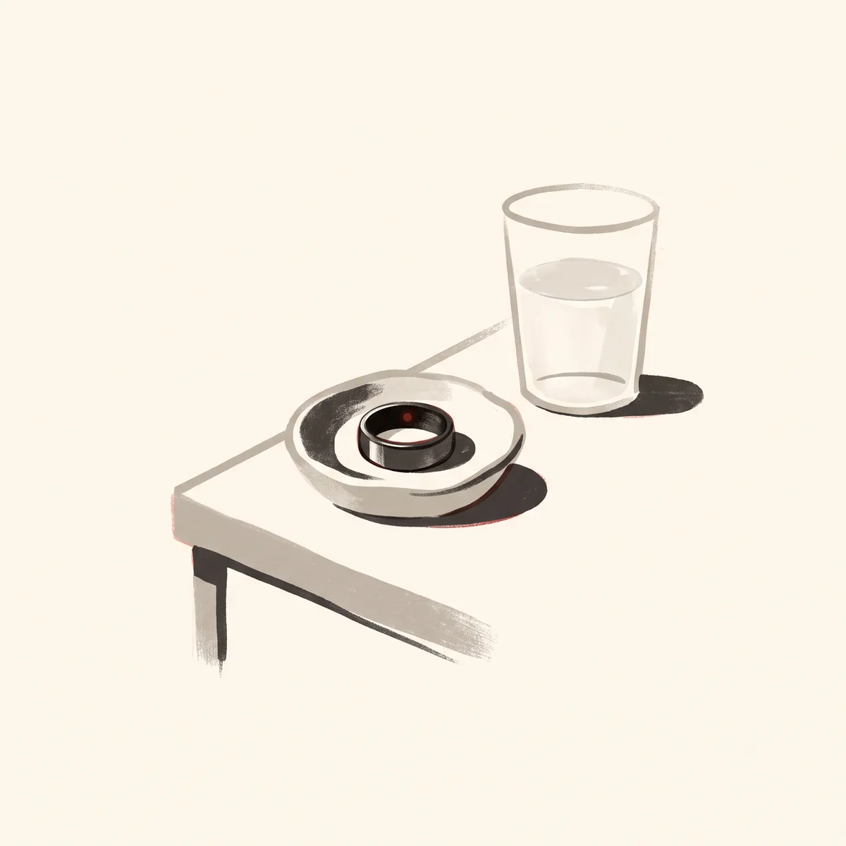 A smart ring left in a small dish on the bedside table beside a glass of water, its red sensor light still on.