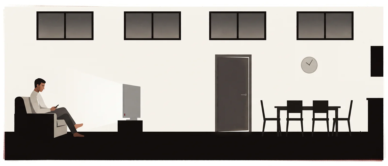 A man sits alone at the far end of a long, tidy living room in the evening, the television on, the dining table empty.